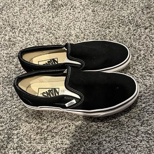 Black and white slip on vans